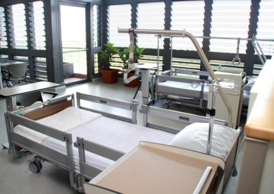 Louvres provide views from hospital beds